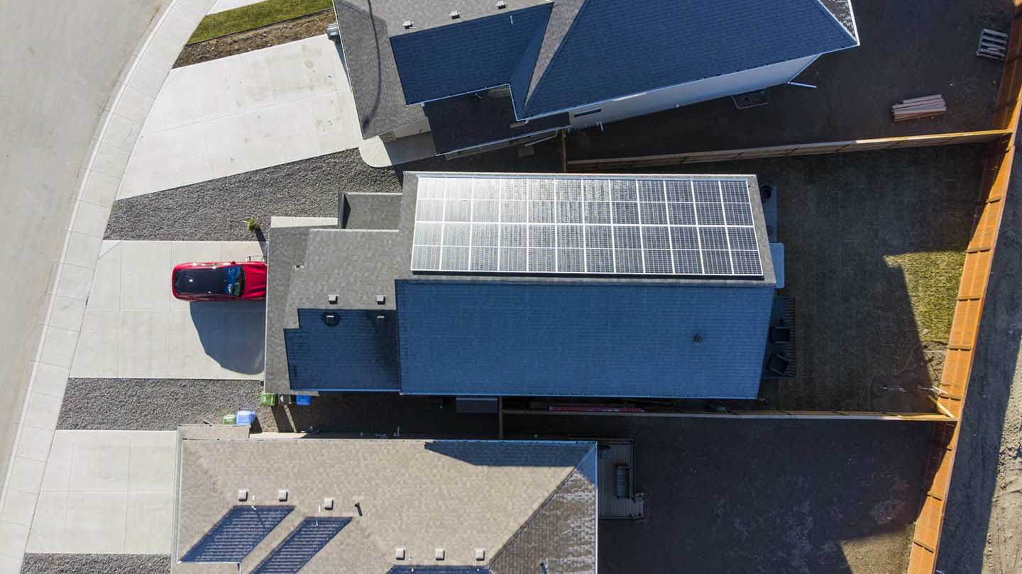 bird's eye view of solar panels on single-family home