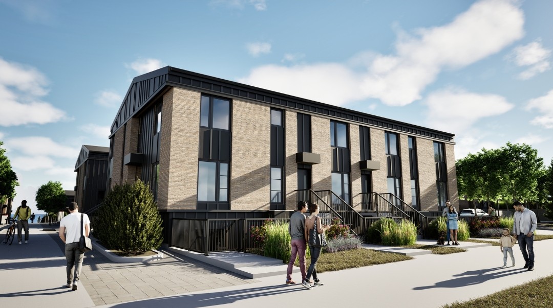 Rendering of ZEN Belmont Net Zero townhomes in Calgary, featuring modern brick and black metal exteriors, large windows, and landscaped green spaces with pathways and seating.
